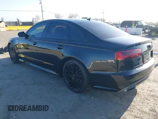 2016 Audi A6 3.0T Premium Plus with VIN WAUFGAFC2GN001285, listed as a IAAI auction lot 41938989 with 119,687 mi miles. Bid and sale history available at carsss.com. Image 3.