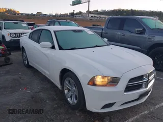 2013 Dodge Charger SE with VIN 2C3CDXBG1DH539849, listed as a IAAI auction lot 41673743 with 191,665 mi miles. Bid and sale history available at carsss.com. Image 6.