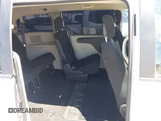 2016 Dodge Grand Caravan SE with VIN 2C4RDGBG2GR311654, listed as a IAAI auction lot 42056032 with 185,330 mi miles and . Bid and sale history available at DreamBid. Image 8.