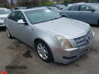 2008 Cadillac CTS AWD w/1SB with VIN 1G6DT57VX80174891, listed as a IAAI auction lot 39161303 with 116,089 mi miles. Bid and sale history available at carsss.com. Image 1.