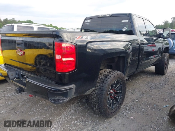 2017 Chevrolet Silverado 1500 LT with VIN 1GCVKREC1HZ197985, listed as a IAAI auction lot 42248714 with 142,123 mi miles and . Bid and sale history available at DreamBid. Image 4.