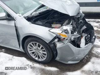2016 Toyota Avalon XLE Premium z VIN 4T1BD1EB0GU049999, wystawiony jako IAAI lot #41624589 z przebiegiem 61 785 mil mil oraz . Historia ofert i sprzedaży dostępna na DreamBid. Obrazek 19.