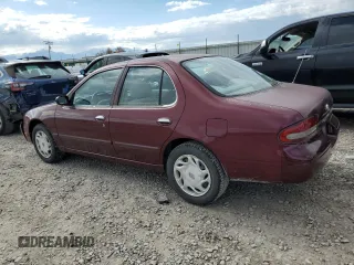 1997 Nissan Altima XE z VIN 1N4BU31DXVC181006, wystawiony jako Copart lot #57670815 z przebiegiem 98 202 mil mil oraz Szkoda całkowita • Salvage title. Historia ofert i sprzedaży dostępna na DreamBid. Obrazek 2.