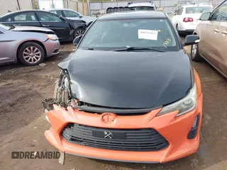 2015 Scion tC with VIN JTKJF5C7XFJ008076, listed as a IAAI auction lot 40856462 with 155,117 mi miles. Bid and sale history available at carsss.com. Image 13.