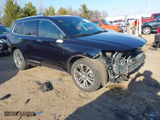 2021 Cadillac XT6 Premium Luxury with VIN 1GYKPFRS9MZ141298, listed as a IAAI auction lot 41304705 with 87,470 mi miles. Bid and sale history available at carsss.com. Image 1.