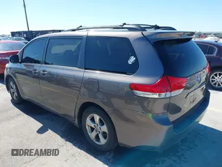 2014 Toyota Sienna LE AAS with VIN 5TDKK3DC8ES457023, listed as a IAAI auction lot 42067713 with 335,130 mi miles. Bid and sale history available at carsss.com. Image 3.