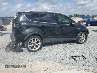 2014 Ford Escape Titanium with VIN 1FMCU0JX7EUA66831, listed as a Copart auction lot 51574815 with 204,150 mi miles and Salvage Title. Bid and sale history available at carsss.com. Image 3.