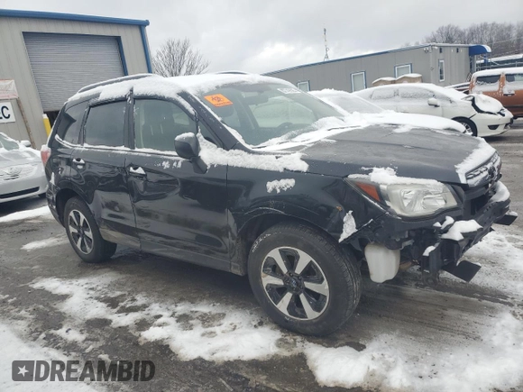2017 Subaru Forester with VIN JF2SJABC4HH477211, listed as a Copart auction lot 87747625 with Not provided miles and Salvage title. Bid and sale history available at DreamBid. Image 4.