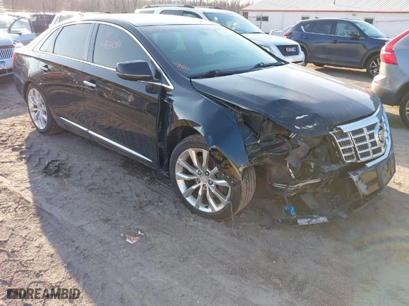 2015 Cadillac XTS Luxury with VIN 2G61N5S34F9226182, listed as a IAAI auction lot 41554394 with 119,194 mi miles. Bid and sale history available at carsss.com. Image 1.