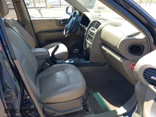 2005 Hyundai Santa Fe GLS with VIN KM8SC73E95U956010, listed as a IAAI auction lot 42134272 with 190,895 mi miles. Bid and sale history available at carsss.com. Image 5.