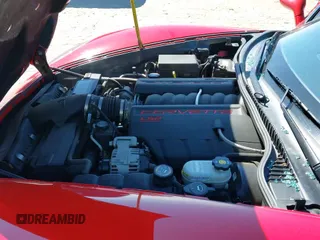 2005 Chevrolet Corvette z VIN 1G1YY34U755127969, wystawiony jako IAAI lot #42188519 z przebiegiem 50 101 mil mil oraz . Historia ofert i sprzedaży dostępna na DreamBid. Obrazek 19.