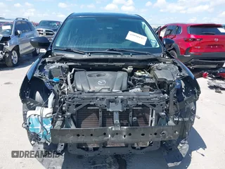 2014 Mazda CX-5 Sport with VIN JM3KE2BE9E0402015, listed as a IAAI auction lot 42098197 with 65,328 mi miles and . Bid and sale history available at carsss.com. Image 13.
