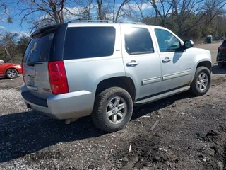2012 GMC Yukon SLT with VIN 1GKS2CE02CR133683, listed as a IAAI auction lot 41375435 with 197,634 mi miles. Bid and sale history available at carsss.com. Image 4.