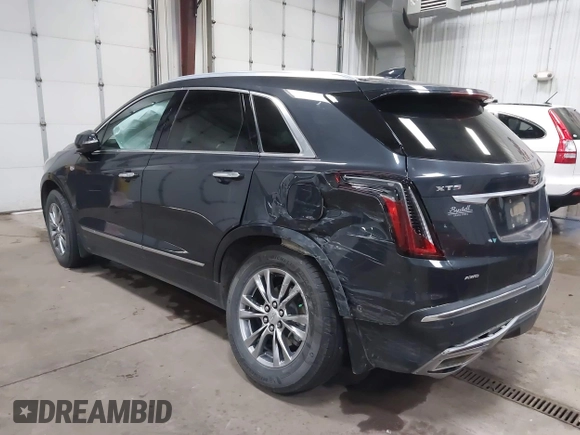 2023 Cadillac XT5 AWD Premium Luxury with VIN 1GYKNDRS2PZ122350, listed as a IAAI auction lot 42123718 with 17,971 mi miles and . Bid and sale history available at DreamBid. Image 3.