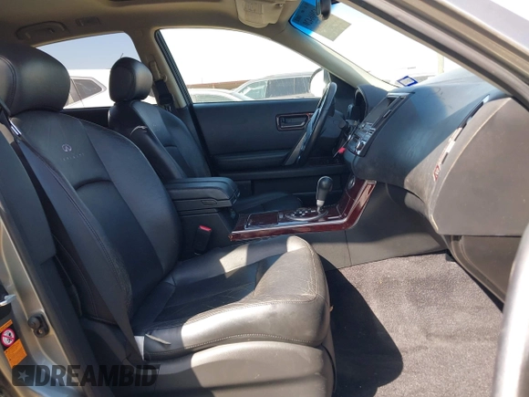 2005 Infiniti FX35 with VIN JNRAS08U55X109879, listed as a IAAI auction lot 42006420 with 150,760 mi miles. Bid and sale history available at carsss.com. Image 5.
