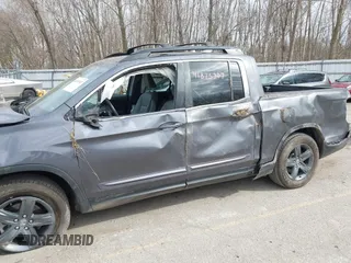2023 Honda Ridgeline RTL z VIN 5FPYK3F58PB014460, wystawiony jako IAAI lot #41875307 z przebiegiem 77 565 mil mil oraz . Historia ofert i sprzedaży dostępna na DreamBid. Obrazek 6.