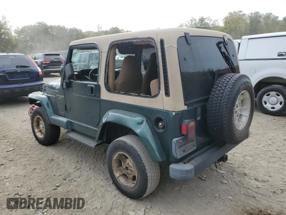 2000 Jeep Wrangler Sahara with VIN 1J4FA59S1YP747919, listed as a Copart auction lot 72278044 with 157,360 mi miles and Salvage Title. Bid and sale history available at carsss.com. Image 2.