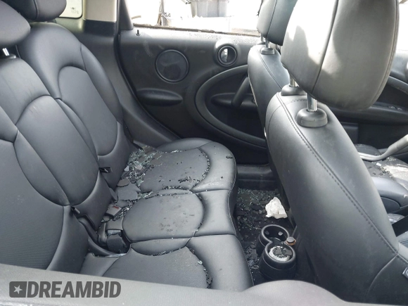 2014 MINI Countryman S with VIN WMWZC3C55EWT00416, listed as a IAAI auction lot 42031870 with Not Provided miles and . Bid and sale history available at DreamBid. Image 8.