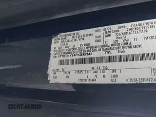 2023 Ford Transit Cargo with VIN 1FTBR1Y84PKB55342, listed as a IAAI auction lot 41511478 with 27,688 mi miles and . Bid and sale history available at DreamBid. Image 9.