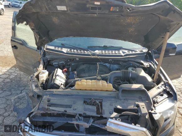 2015 Ford F-150 XLT with VIN 1FTEW1EG9FFC53288, listed as a Copart auction lot 52575555 with 118,816 mi miles and Salvage title. Bid and sale history available at DreamBid. Image 12.