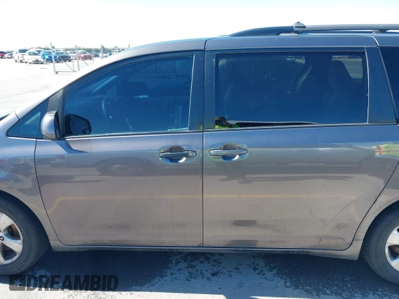 2014 Toyota Sienna LE AAS with VIN 5TDKK3DC8ES457023, listed as a IAAI auction lot 42067713 with 335,130 mi miles. Bid and sale history available at carsss.com. Image 15.