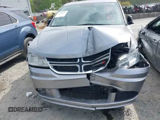 2017 Dodge Journey SE z VIN 3C4PDCAB0HT694918, wystawiony jako IAAI lot #42010594 z przebiegiem 135 432 mil mil oraz . Historia ofert i sprzedaży dostępna na DreamBid. Obrazek 6.