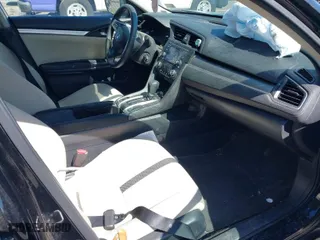 2017 Honda Civic Sedan LX with VIN 2HGFC2F57HH533231, listed as a IAAI auction lot 41897620 with 141,210 mi miles. Bid and sale history available at carsss.com. Image 5.