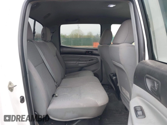 2014 Toyota Tacoma with VIN 3TMLU4EN8EM139665, listed as a IAAI auction lot 41925143 with 190,690 mi miles and . Bid and sale history available at DreamBid. Image 8.
