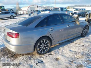2018 Audi A6 Sport with VIN WAUF3AFC9JN078755, listed as a IAAI auction lot 41398722 with 51,677 mi miles. Bid and sale history available at carsss.com. Image 4.
