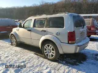 2008 Dodge Nitro SLT z VIN 1D8GU58K68W211350, wystawiony jako Copart lot #86813294 z przebiegiem Nie podano mil oraz Szkoda całkowita • Salvage title. Historia ofert i sprzedaży dostępna na DreamBid. Obrazek 2.