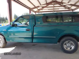 1997 Ford F-150 with VIN 1FTDF1727VKC49064, listed as a IAAI auction lot 42256020 with 197,494 mi miles and . Bid and sale history available at DreamBid. Image 14.