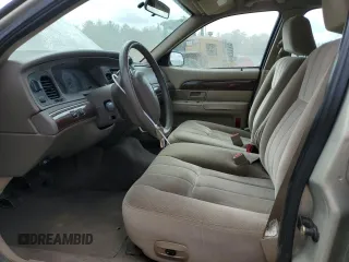 2004 Mercury Grand Marquis GS z VIN 2MEFM74W94X601693, wystawiony jako Copart lot #56303935 z przebiegiem 98 674 mil mil oraz Czysty tytuł • Clean title. Historia ofert i sprzedaży dostępna na DreamBid. Obrazek 7.