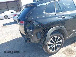 2024 Toyota Corolla Cross XLE z VIN 7MUDAAAG0RV080383, wystawiony jako IAAI lot #42032391 z przebiegiem 16 593 mil mil oraz . Historia ofert i sprzedaży dostępna na DreamBid. Obrazek 22.