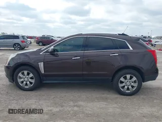 2015 Cadillac SRX Luxury Collection z VIN 3GYFNBE35FS597538, wystawiony jako IAAI lot #42056002 z przebiegiem 49 483 mil mil oraz . Historia ofert i sprzedaży dostępna na DreamBid. Obrazek 14.