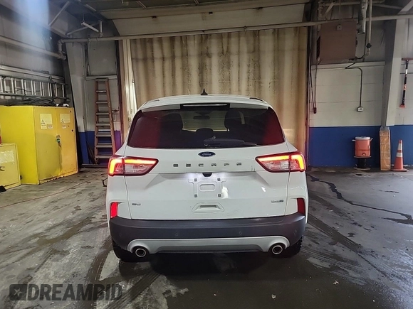 2020 Ford Escape SE with VIN 1FMCU9G63LUB84469, listed as a IAAI auction lot 42547664 with 58,786 mi miles and . Bid and sale history available at DreamBid. Image 36.