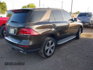 2016 Mercedes-Benz GLE 350 with VIN 4JGDA5HB4GA601560, listed as a IAAI auction lot 42527776 with 100,418 mi miles and . Bid and sale history available at DreamBid. Image 4.
