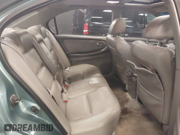 2002 Nissan Maxima GLE z VIN JN1DA31A12T308581, wystawiony jako IAAI lot #41742949 z przebiegiem 116 892 mil mil oraz . Historia ofert i sprzedaży dostępna na DreamBid. Obrazek 8.