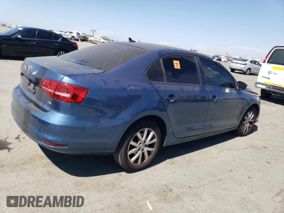 2015 Volkswagen Jetta SE with VIN 3VWD17AJ8FM242150, listed as a Copart auction lot 63433785 with 140,436 mi miles and Salvage title. Bid and sale history available at DreamBid. Image 3.
