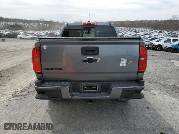 2020 Chevrolet Colorado 4WD LT with VIN 1GCGTCEN4L1130681, listed as a Copart auction lot 49801695 with 51,772 mi miles and Salvage title. Bid and sale history available at DreamBid. Image 6.