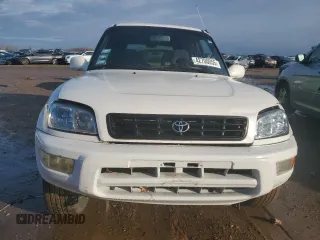 1999 Toyota RAV4 with VIN JT3GP10V7X7063436, listed as a Copart auction lot 42700055 with 159,001 mi miles and Salvage Title. Bid and sale history available at DreamBid. Image 5.