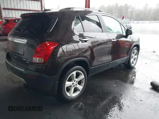 2015 Chevrolet Trax LTZ with VIN KL7CJTSB9FB147244, listed as a IAAI auction lot 41722081 with 125,675 mi miles. Bid and sale history available at carsss.com. Image 4.