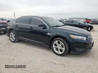 2014 Ford Taurus SEL z VIN 1FAHP2E84EG133955, wystawiony jako Copart lot #56630155 z przebiegiem 113 045 mil mil oraz Szkoda całkowita • Salvage title. Historia ofert i sprzedaży dostępna na DreamBid. Obrazek 4.