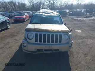 2010 Jeep Patriot Sport with VIN 1J4NF1GBXAD640562, listed as a IAAI auction lot 41869559 with 141,581 mi miles and . Bid and sale history available at DreamBid. Image 12.