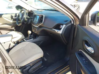 2015 Jeep Cherokee Latitude with VIN 1C4PJMCSXFW725644, listed as a IAAI auction lot 41312764 with 191,714 mi miles and . Bid and sale history available at DreamBid. Image 5.