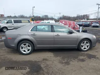 2011 Chevrolet Malibu 1LS with VIN 1G1ZB5E18BF251602, listed as a IAAI auction lot 41880910 with 76,049 mi miles and . Bid and sale history available at DreamBid. Image 13.