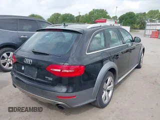 2014 Audi allroad Premium Plus with VIN WA1UFAFL2EA092988, listed as a IAAI auction lot 41879196 with 147,063 mi miles. Bid and sale history available at carsss.com. Image 4.