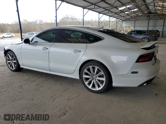 2016 Audi A7 3.0 Premium Plus with VIN WAUWGAFC5GN018677, listed as a Copart auction lot 38723524 with 131,621 mi miles. Bid and sale history available at carsss.com. Image 2.