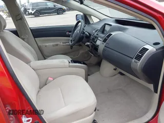 2007 Toyota Prius z VIN JTDKB20U673288178, wystawiony jako IAAI lot #42362578 z przebiegiem 104 388 mil mil oraz . Historia ofert i sprzedaży dostępna na DreamBid. Obrazek 5.