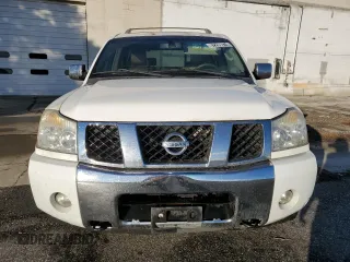 2006 Nissan Armada LE z VIN 5N1AA08B46N715720, wystawiony jako Copart lot #87299074 z przebiegiem 141 564 mil mil oraz Czysty tytuł • Clean title. Historia ofert i sprzedaży dostępna na DreamBid. Obrazek 5.