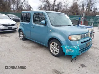 2010 Nissan Cube S z VIN JN8AZ2KRXAT170470, wystawiony jako IAAI lot #41751544 z przebiegiem 108 437 mil mil oraz . Historia ofert i sprzedaży dostępna na DreamBid. Obrazek 1.